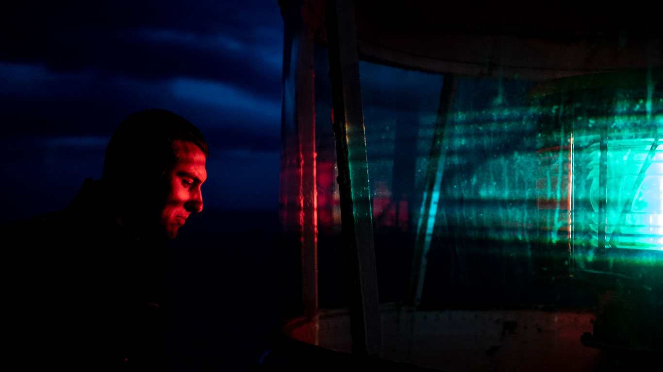Man looking in light house light
